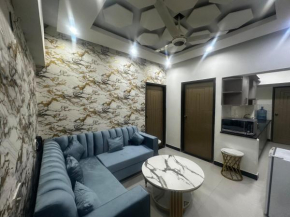 Designer Flat 2 Bedrooms lounge Kitchen Hot Water 24-7 electricity water gas lift with standby generator Security Surveylance Parking